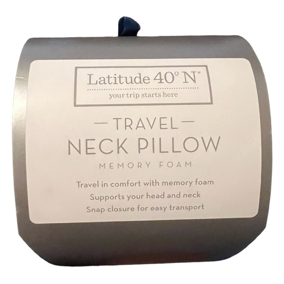 A blue travel neck pillow - Picture 2 of 3